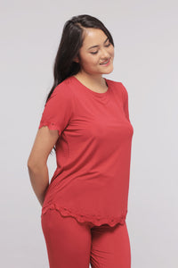 Romantic red lace top for a stylish and elegant look.