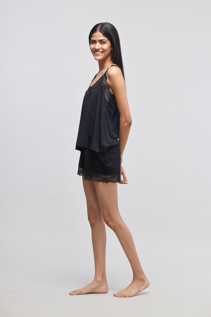 Delicate black lace shorts set featuring a stylish tank top.
