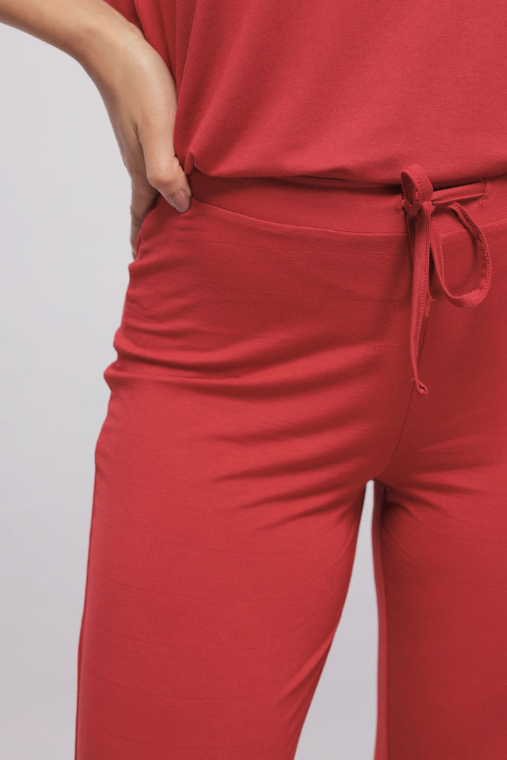 Romantic red lace pajamas with stylish tie waist detail.