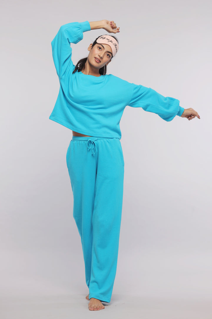 Aqua Terry Travel Loungers in vibrant blue, perfect for relaxed outings.