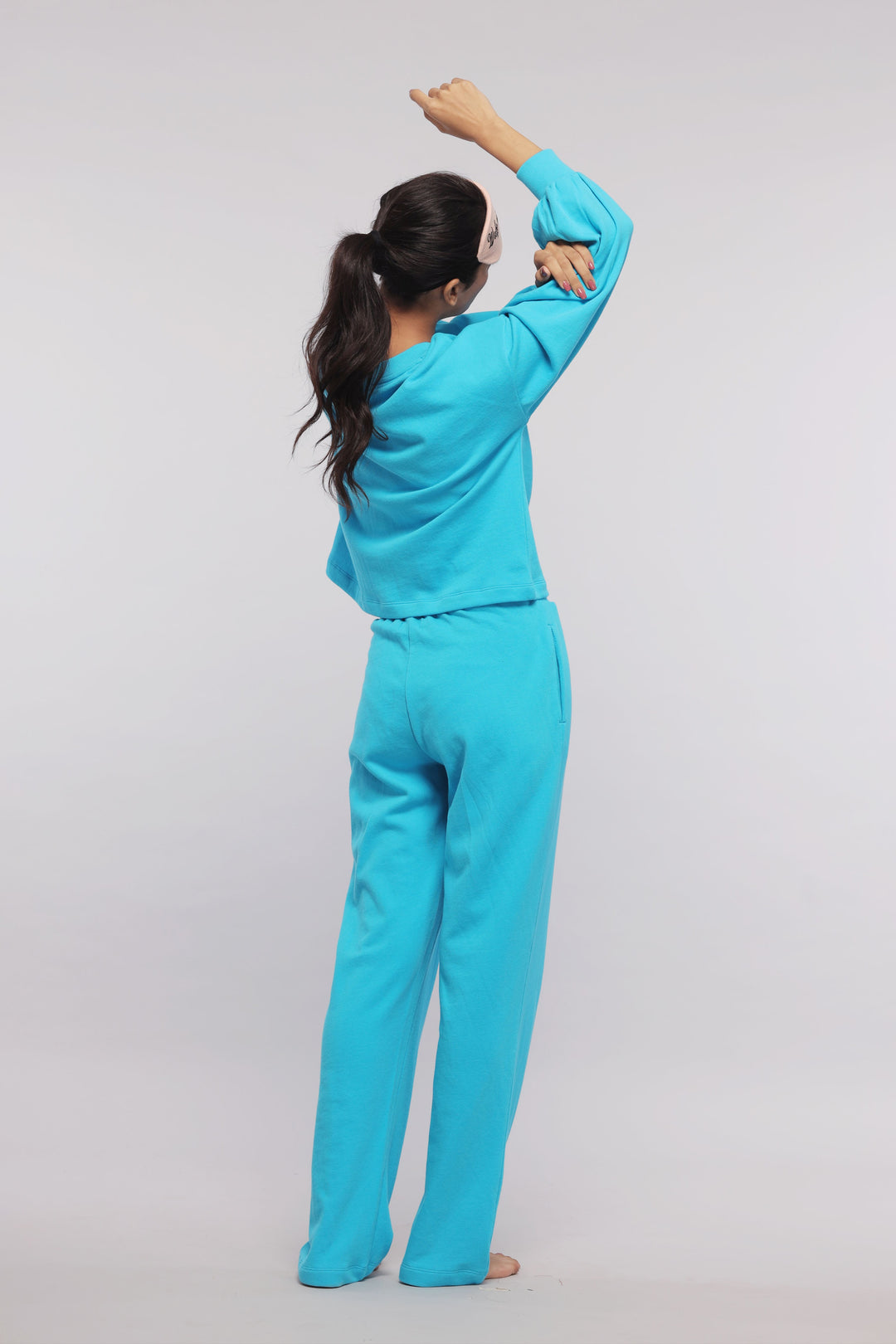 Aqua Terry Travel Loungers in stylish blue, perfect for comfort.