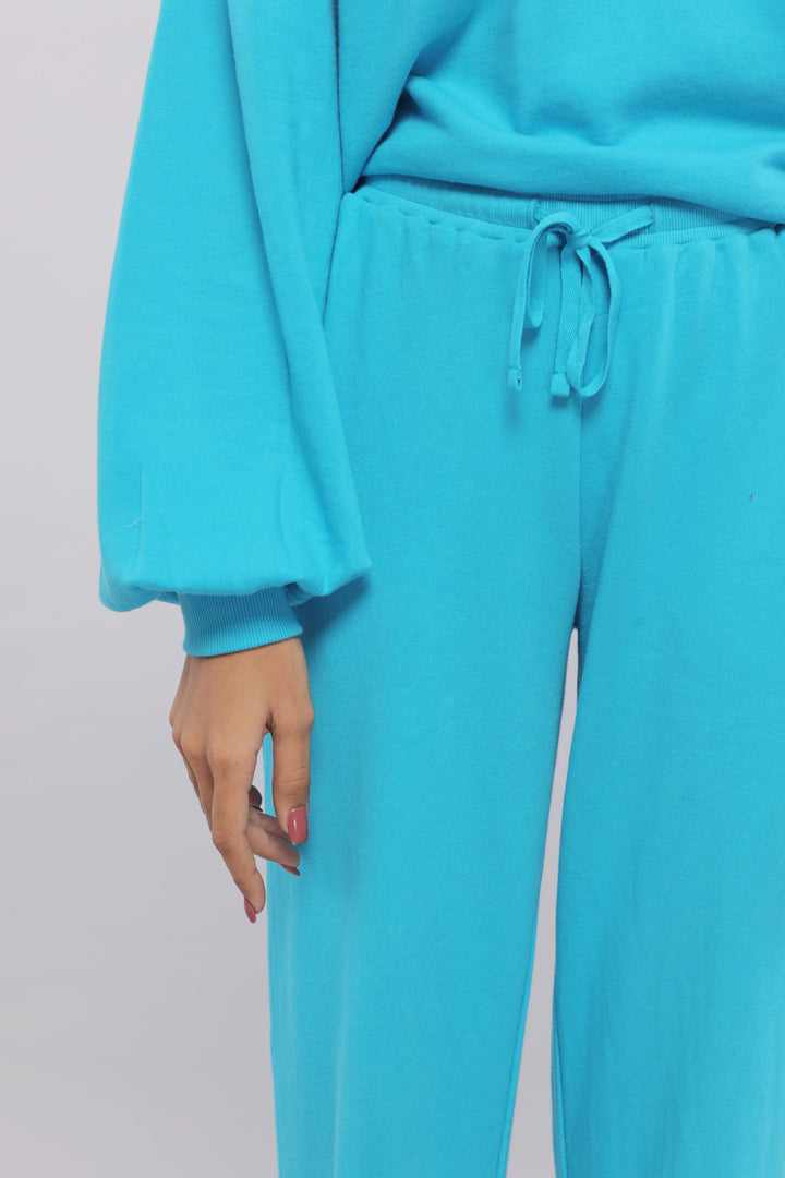 Close-up of Aqua Terry Travel Loungers in vibrant blue fabric.