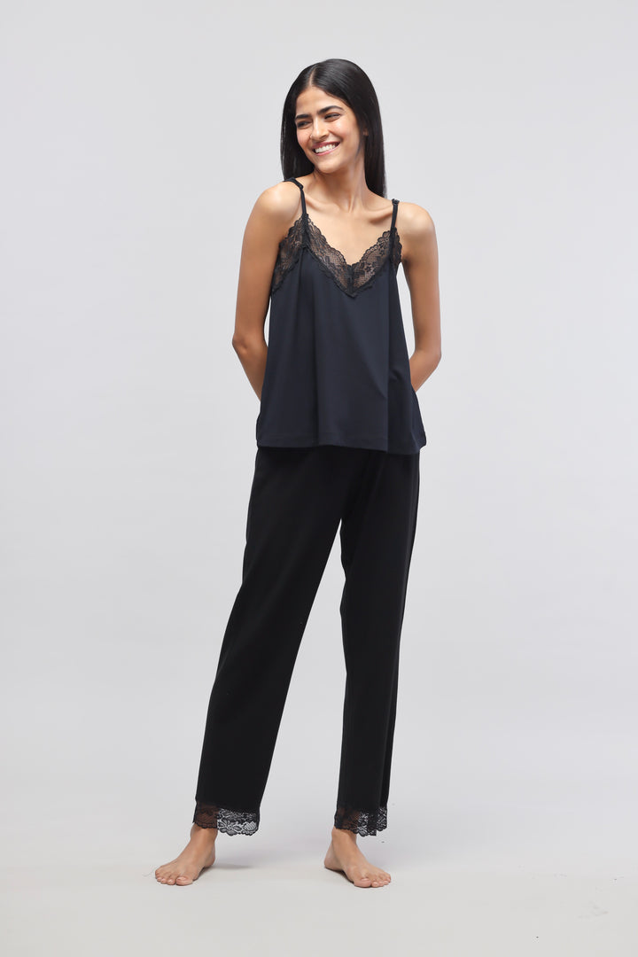 Delicate black lace pajama set with tank top for women.
