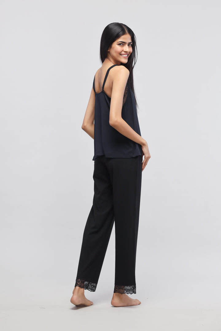 Delicate black lace pajama set with tank top for women.