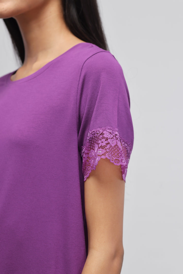 Dreamy purple lace pajama set with elegant lace detailing on sleeves.