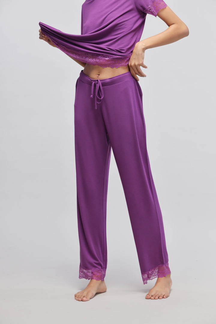 Dreamy purple lace pajama set for stylish and comfortable sleepwear.
