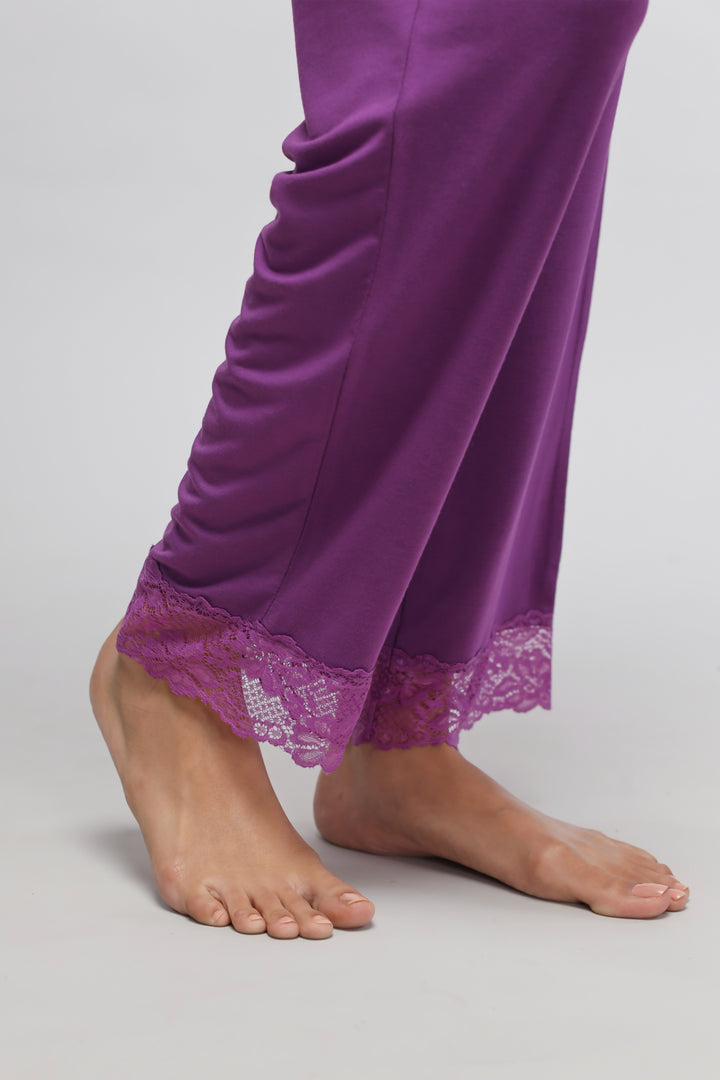 Dreamy purple lace pajama set with elegant lace trim details.