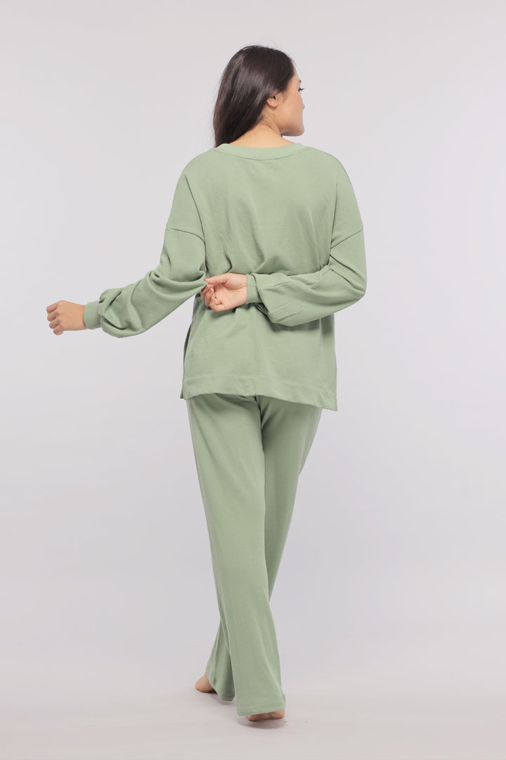 Mint green long sweatshirt with matching pants, comfortable loungewear outfit.