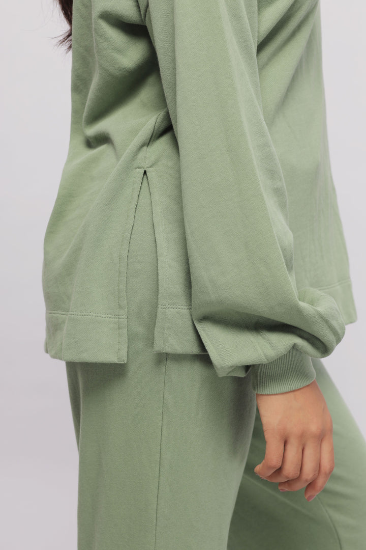 Mint green terry travel set featuring stylish cuts and comfortable design.