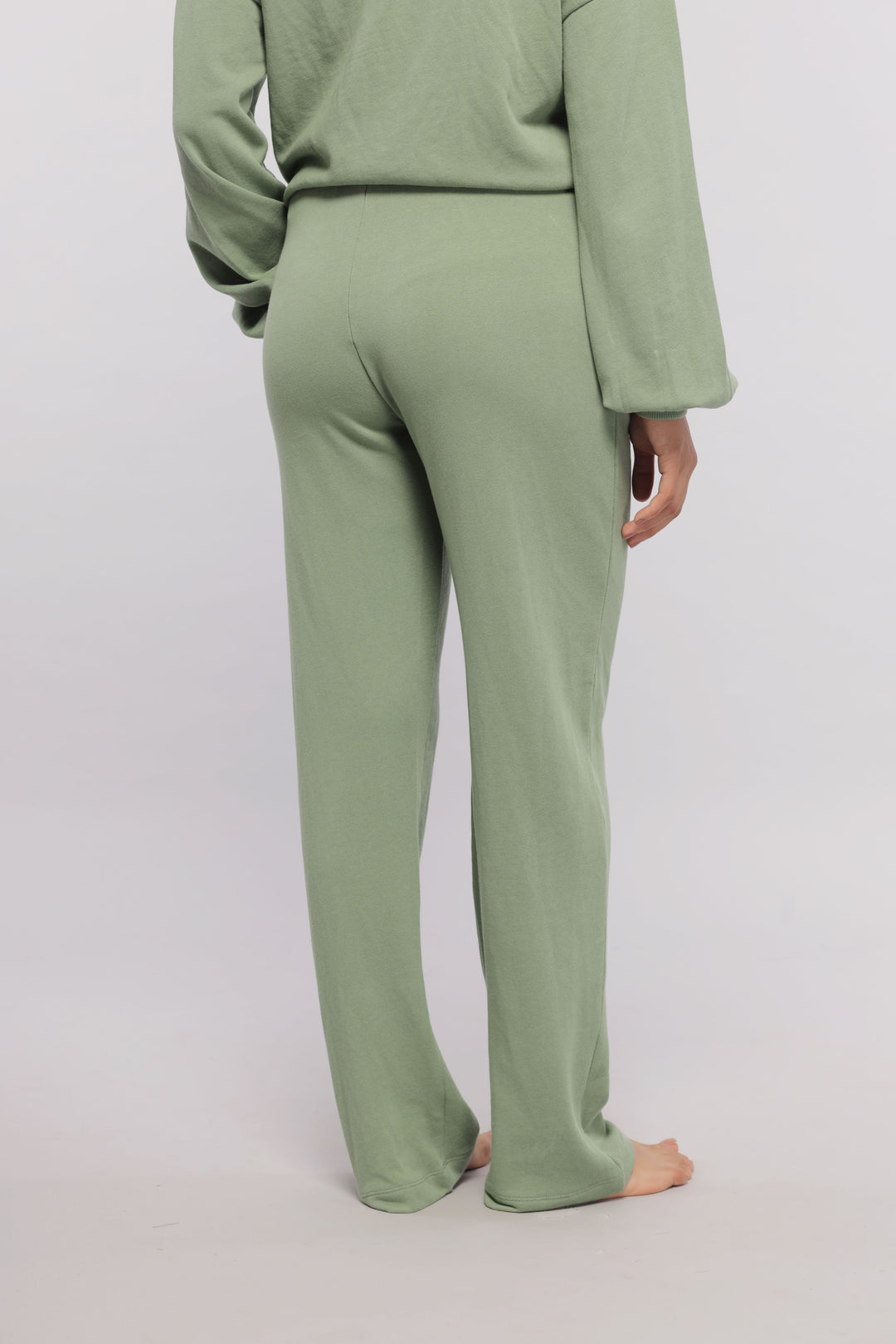 Mint green terry travel loungers for comfortable relaxation.