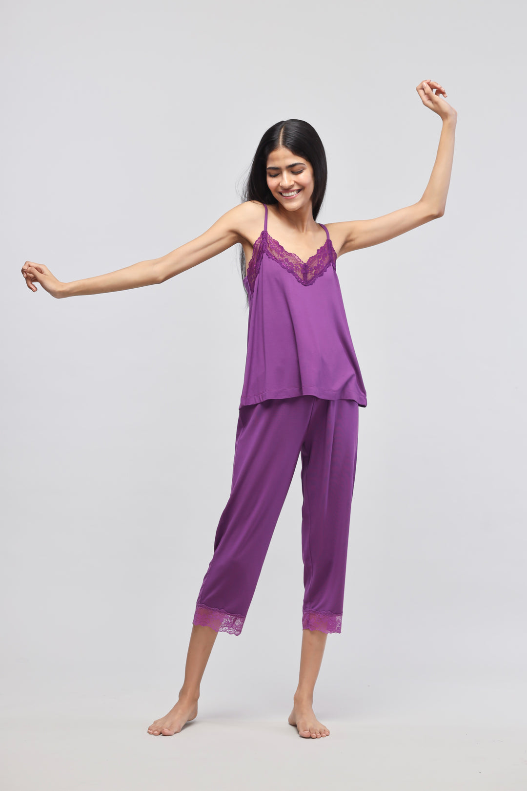 Dreamy Purple Lace Capri Set featuring a smiling model in comfortable sleepwear.