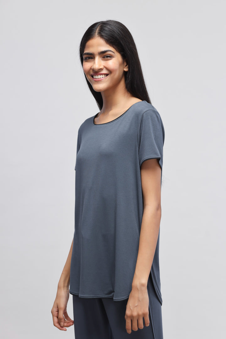 Deep Blue Piping Top on model, stylish and comfortable casual wear.