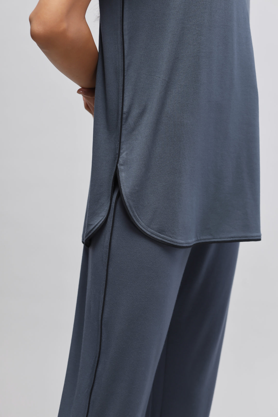 Deep Blue Piping Top showcasing elegant design and comfortable fit.