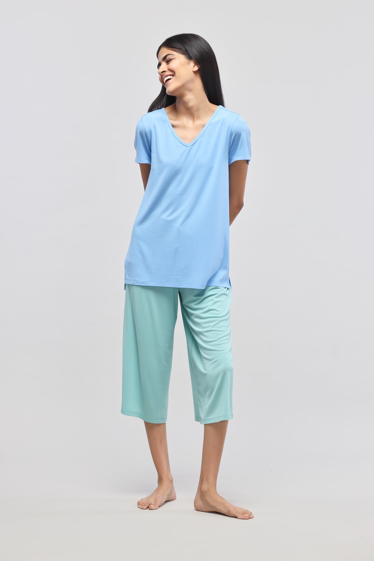 Aqua culotte set featuring a stylish blue top and mint green bottoms.