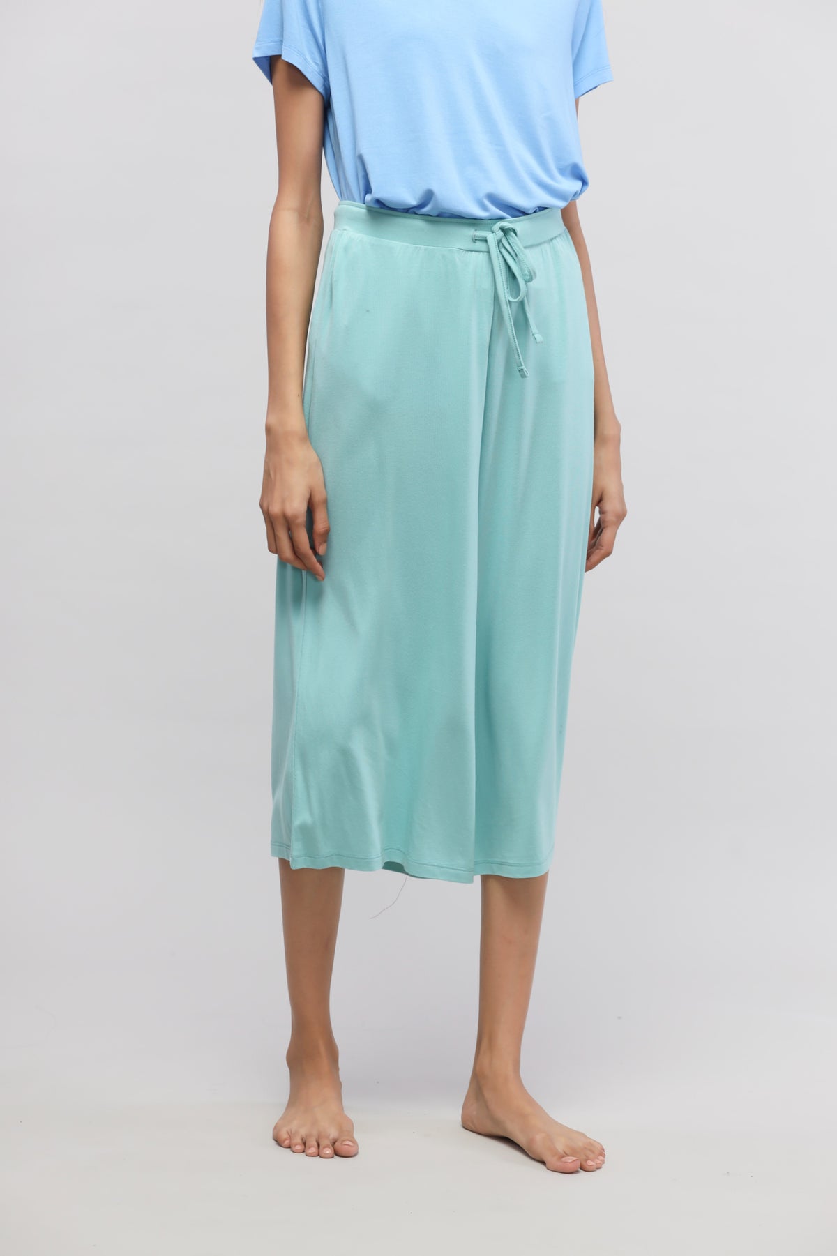 Mint aqua culottes with drawstring waist and relaxed fit.