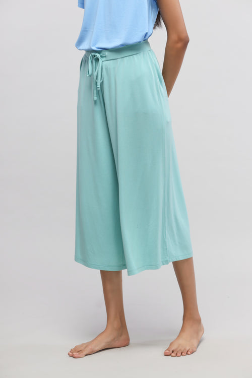 Aqua culottes with drawstring waist and relaxed fit for casual styling.