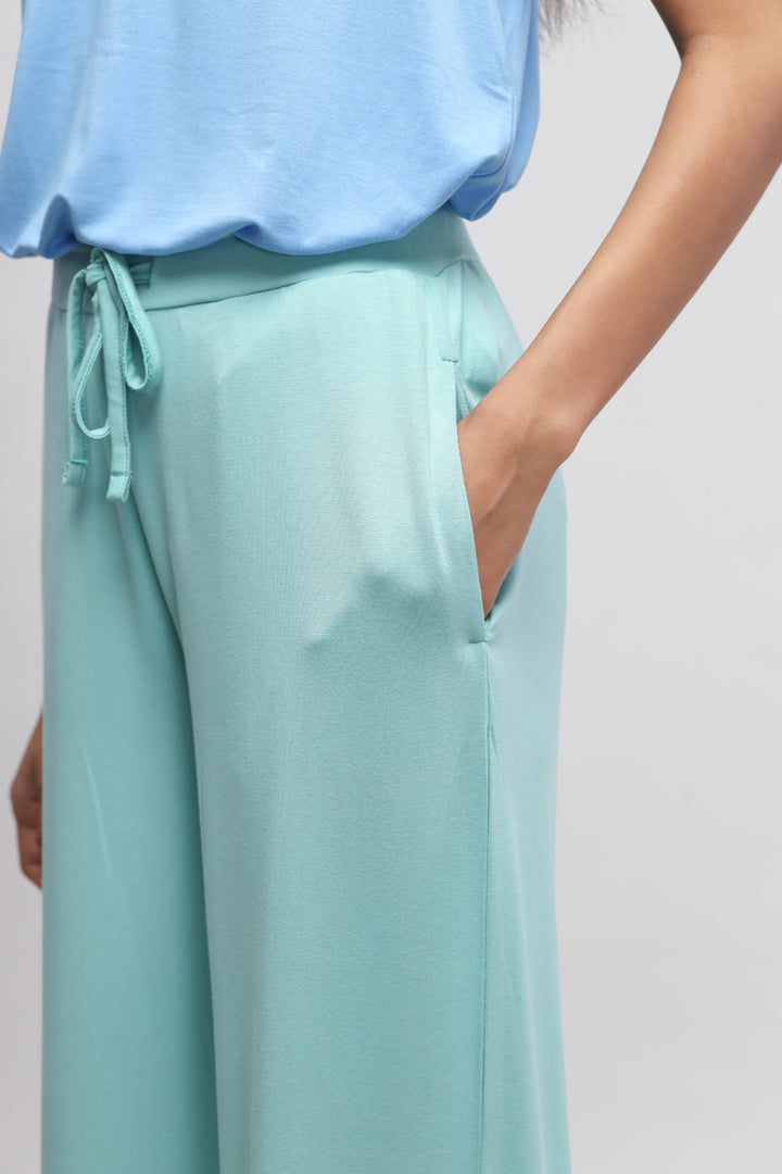 Aqua Flared Pajama Set showcasing comfortable loungewear with pockets.