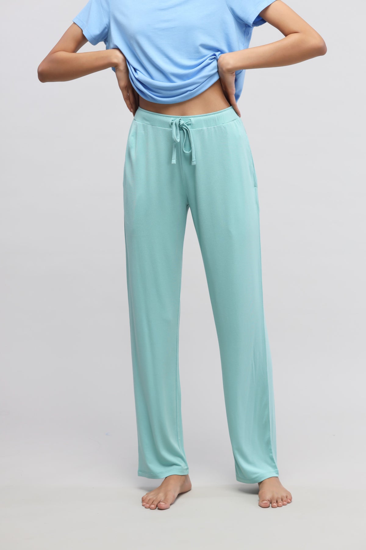 Aqua straight lounge pant on a model, styled for comfort and relaxation.