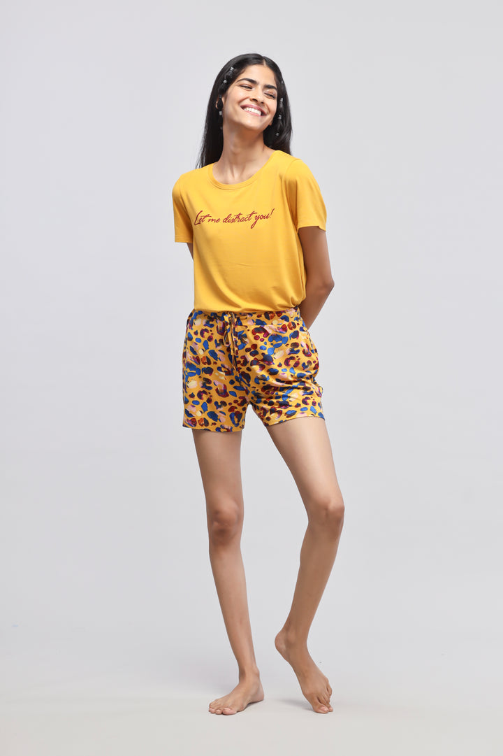 Safari Modal Shorts Set featuring a yellow top and colorful shorts.