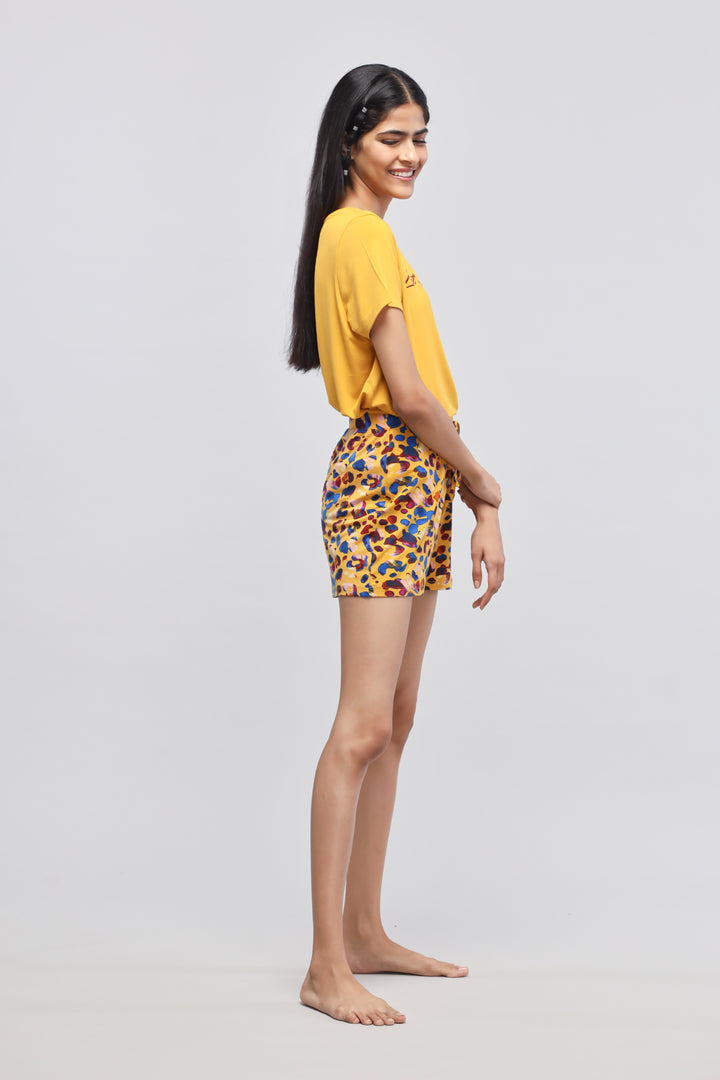Model wearing Safari Modal Shorts Set in vibrant colors.