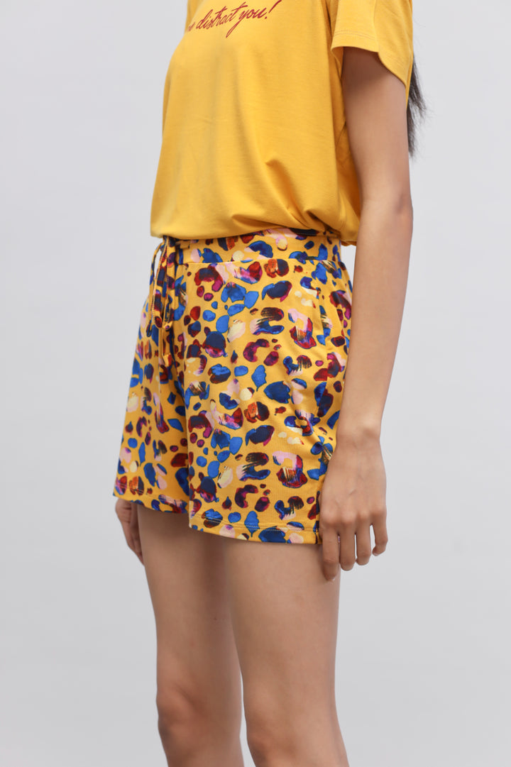 "Model wearing Safari Modal Shorts Set with vibrant colors."