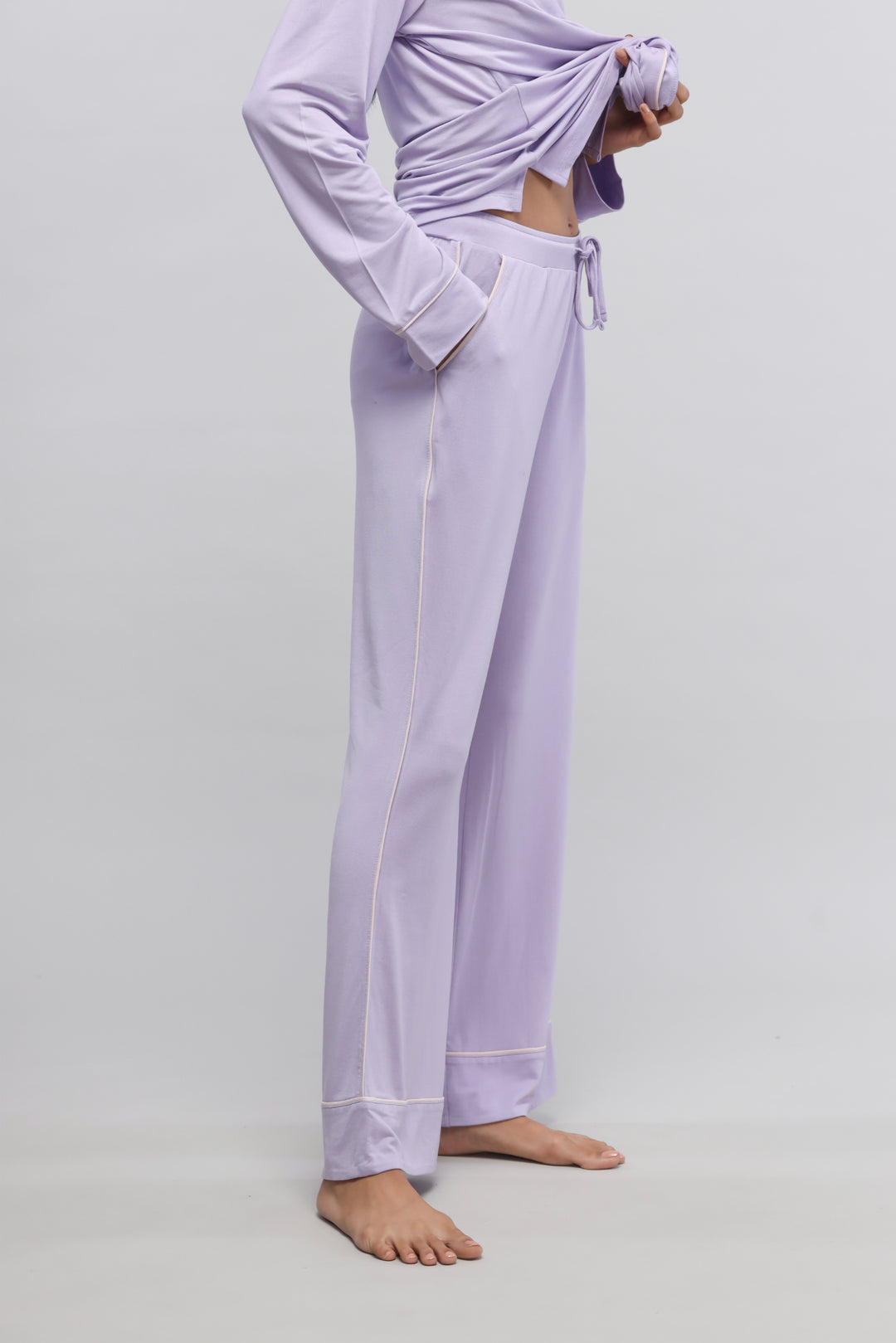 Lavender piping pajamas in a casual, stylish fit for comfort.