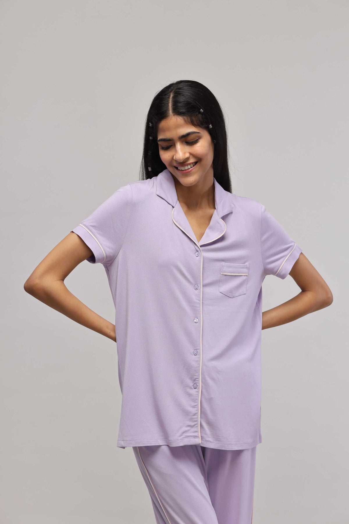 Lavender button-down half sleeve top with piping detail for women.