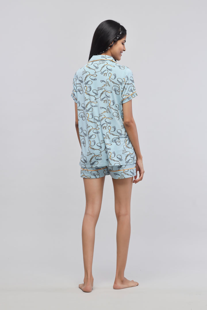 Rope printed half sleeve piping top in light blue color.