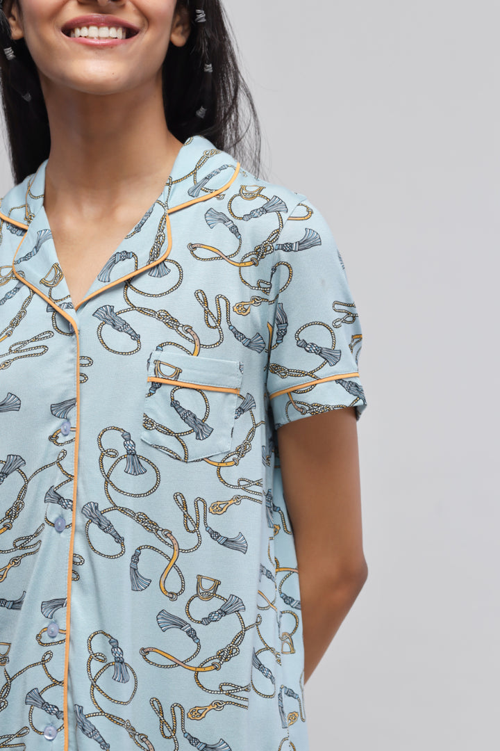 Rope printed half sleeve top with stylish piping details.