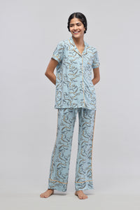 Rope printed half sleeve pajama set model posing in casual wear.