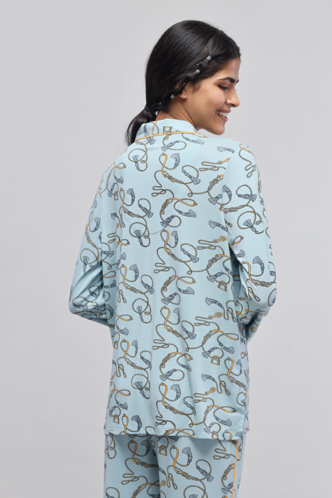Rope printed full sleeve piping top in light blue fabric.