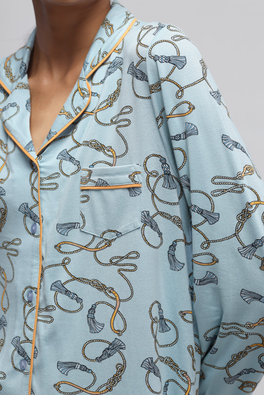 Rope printed full sleeve pajama set in light blue color.