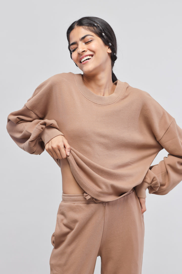 Stylish brown terry puffed sweatshirt, perfect for casual wear.