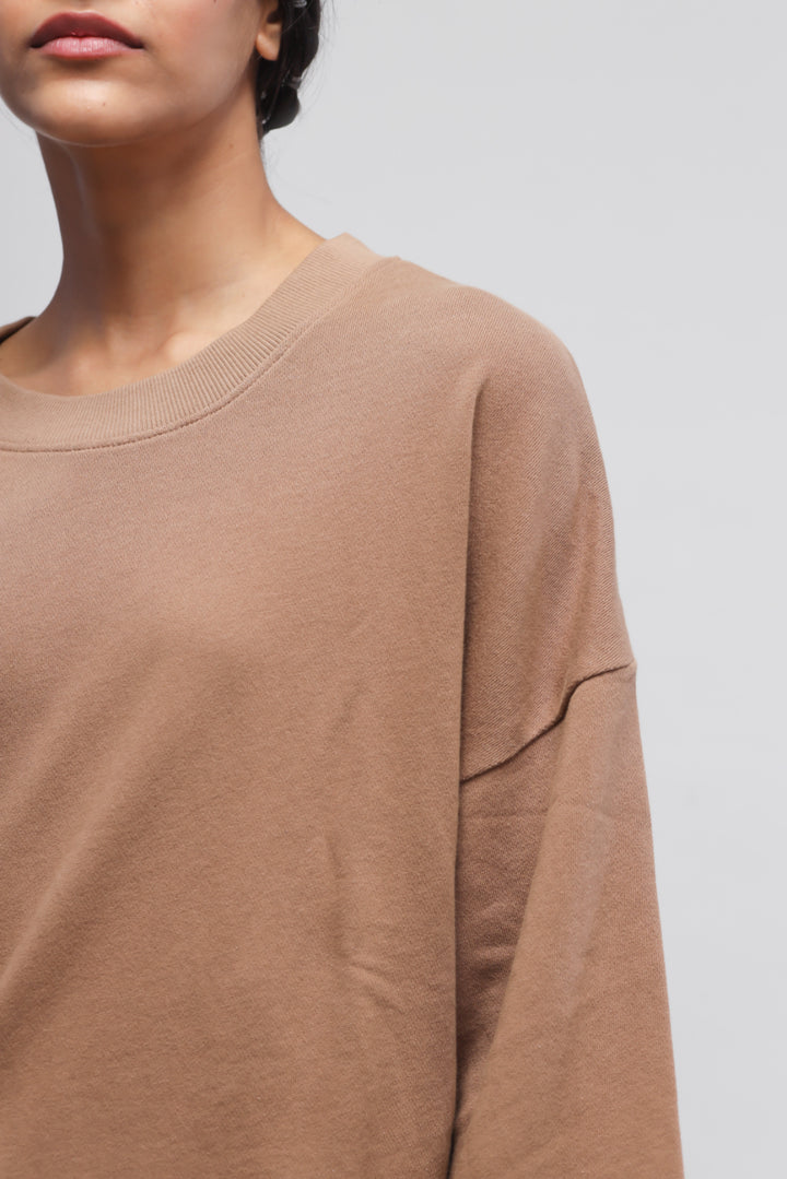 Brown terry puffed sweatshirt for comfortable and stylish casual wear.