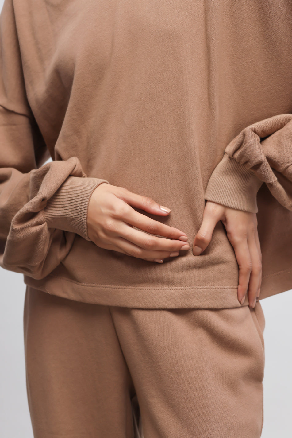 Brown Terry Puffed Sweatshirt with stylish puffed sleeves and comfortable fit.