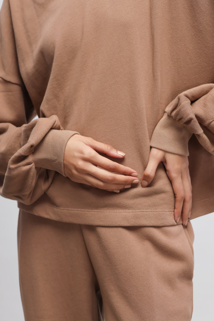 Brown Terry Puffed Sweatshirt with stylish puffed sleeves and comfortable fit.