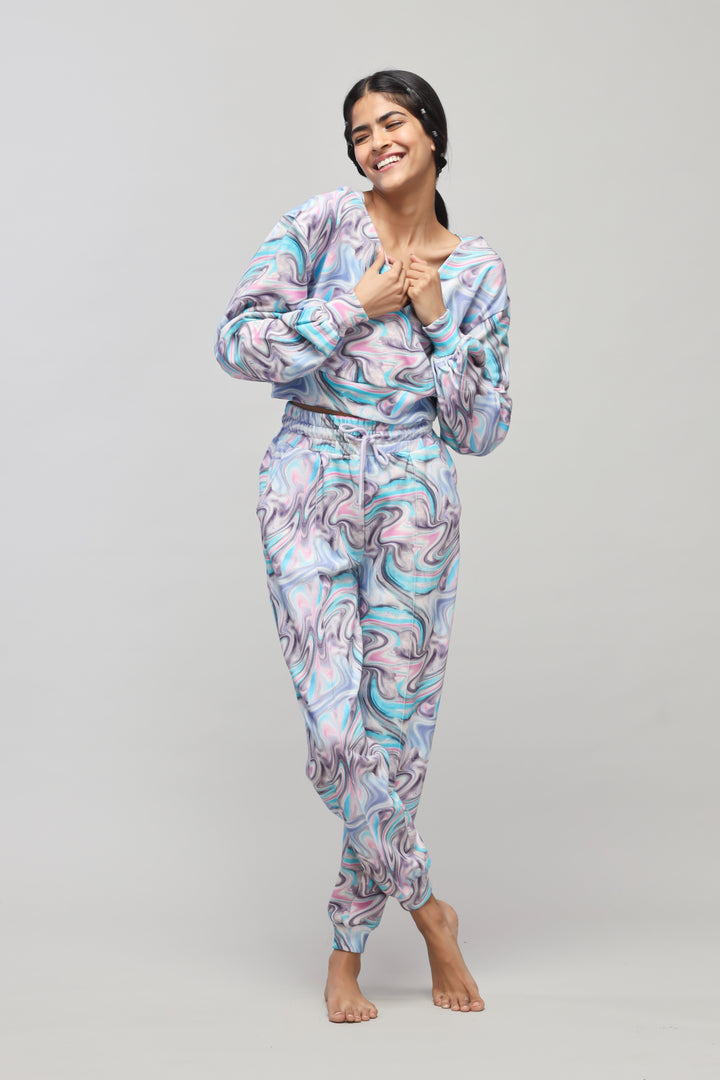 Stylish Fluid Terry Hoodie with colorful swirl design for comfort.