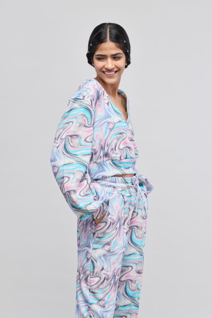 Colorful fluid terry hoodie model showcasing modern design and style.
