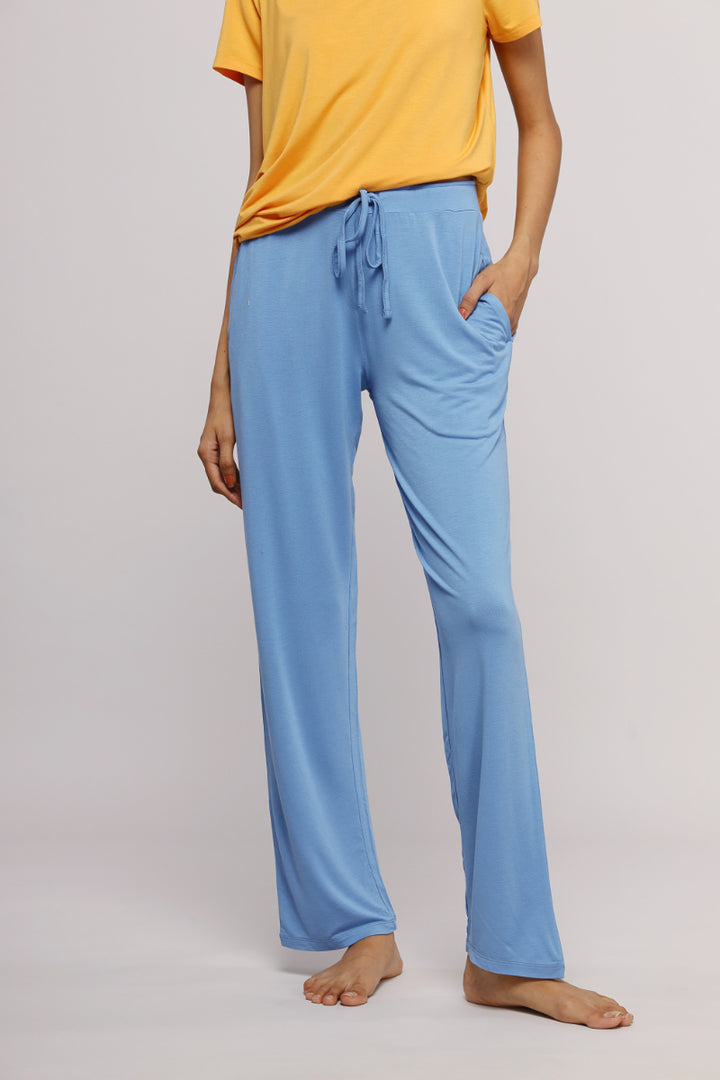 Cozy blue lounge set featuring comfortable straight pants and top.
