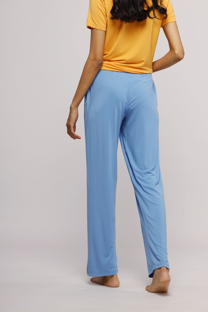 Cozy blue lounge set featuring a stylish top and soft pants.