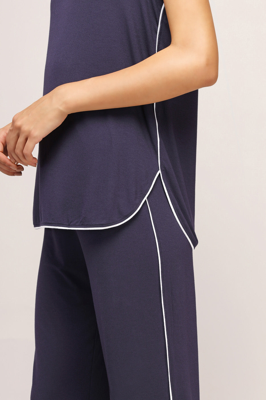 Love Sleep Piping Pajamas Set in navy with white trim details.