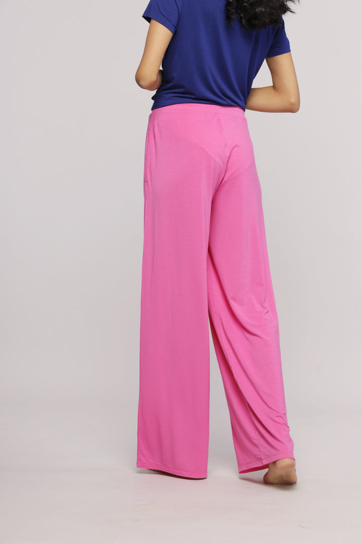 Back view of Professional Sleepyhead Flared Pajama Set with pink pants.