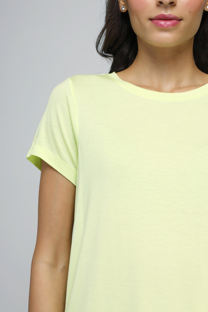 Bright yellow lightweight Rise And Run Top for active lifestyle.