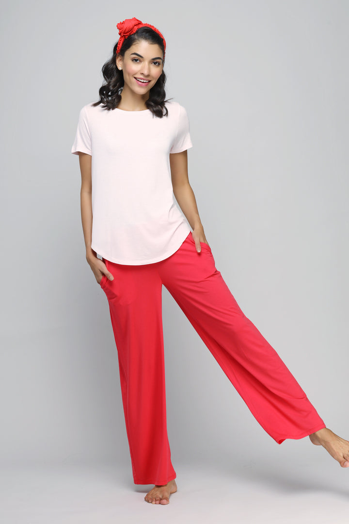 Love Red Flared Lounge Set modeled by a smiling woman.