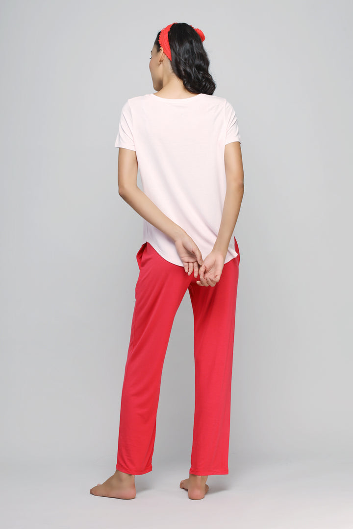 Model wearing Love Red Straight Lounge Pant from the back.