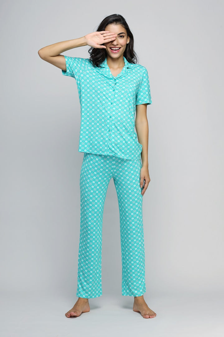 Women’s turquoise button-down pajama set for comfortable nights in Barcelona.
