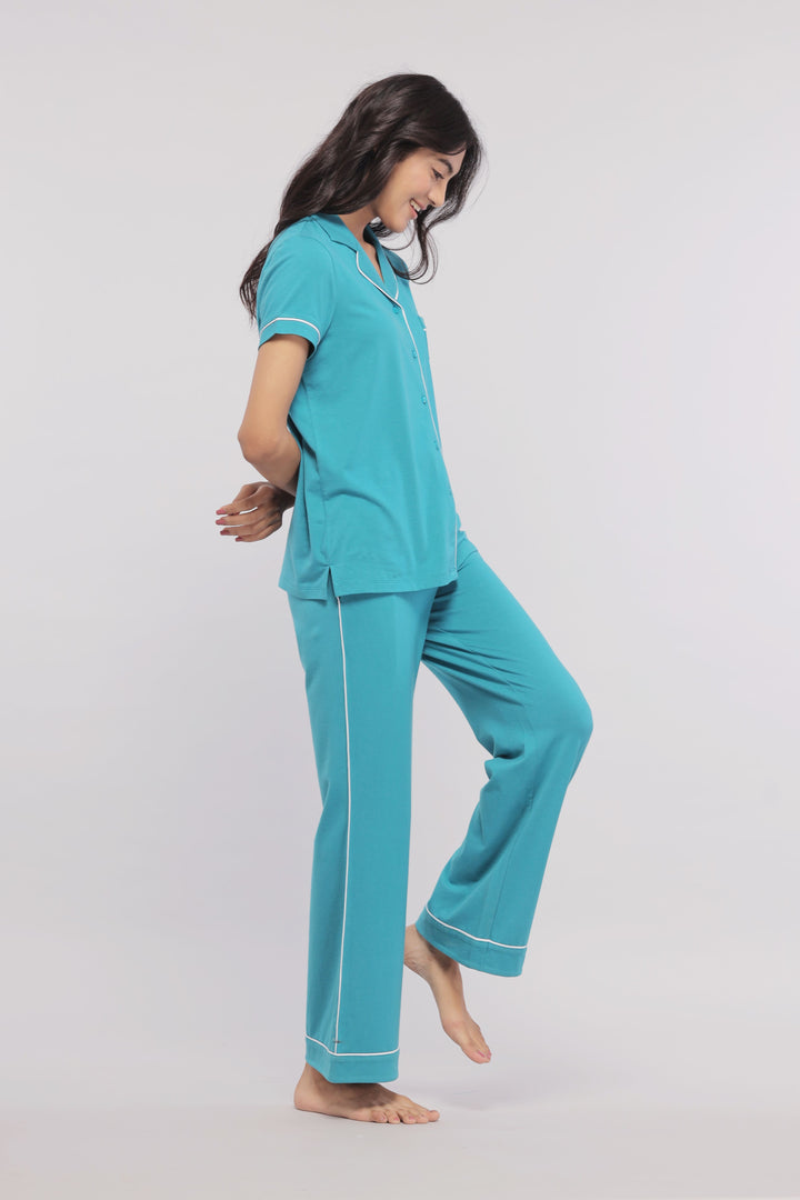 Teal half sleeve button-down pajama set for women, stylish and comfortable.