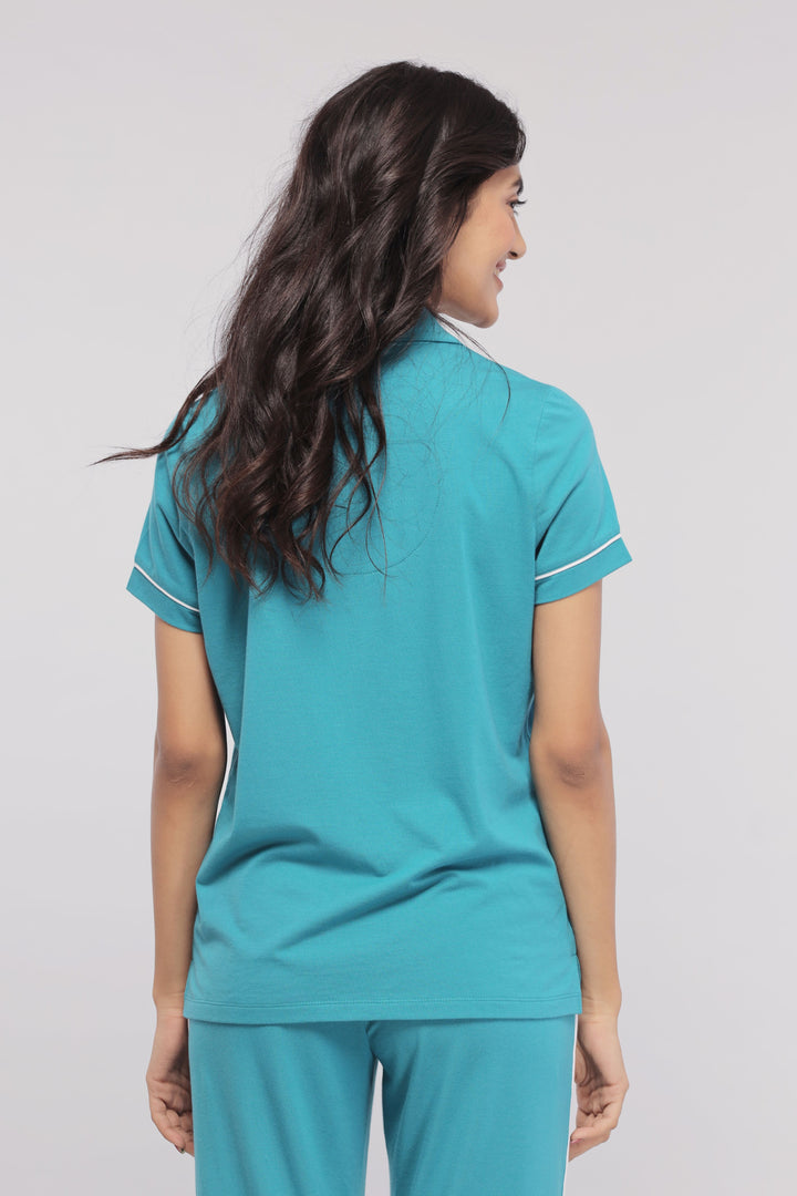 Teal half sleeve button down pajama set, back view on model.