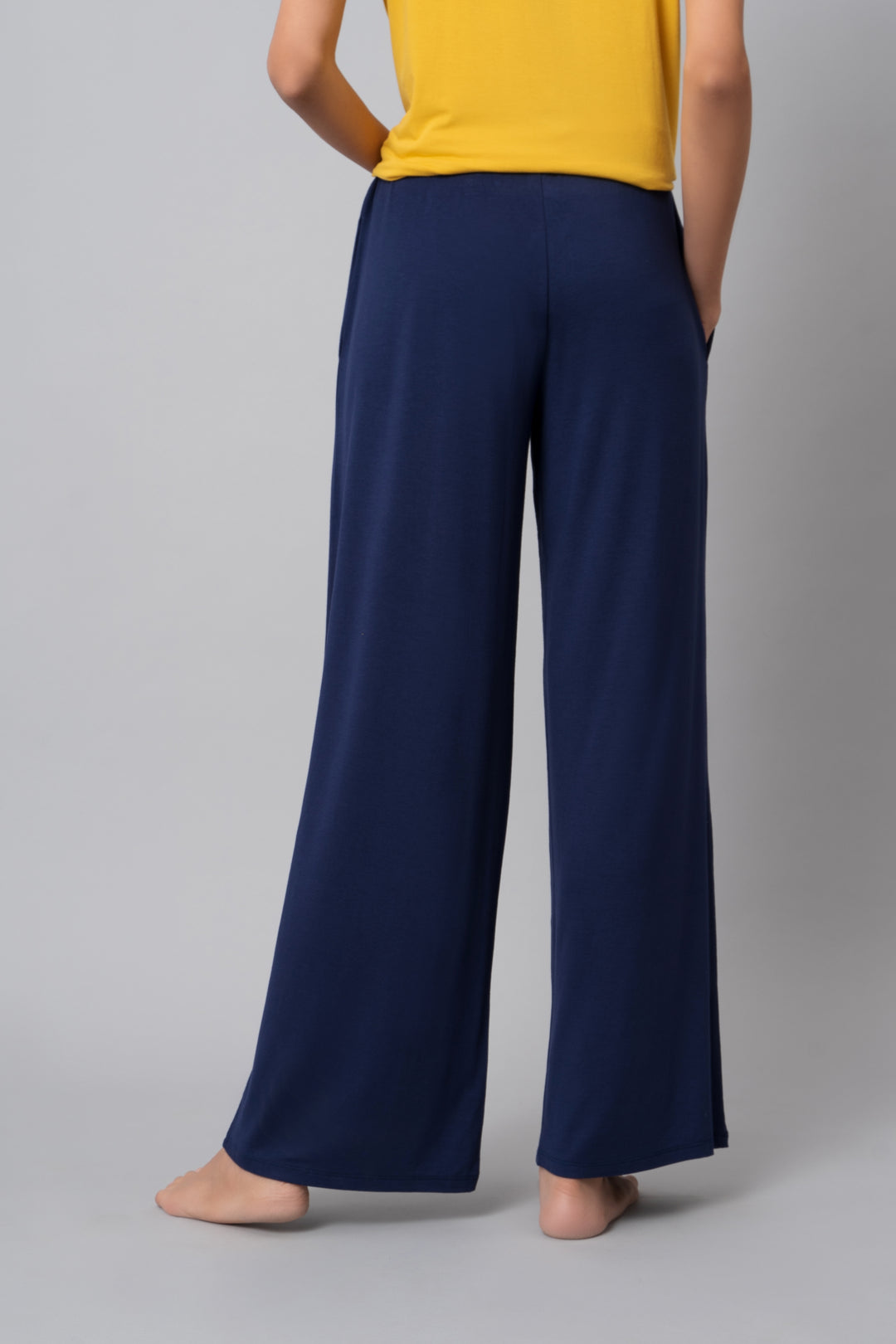 Indigo flared lounge set featuring comfortable, stylish pants and top.