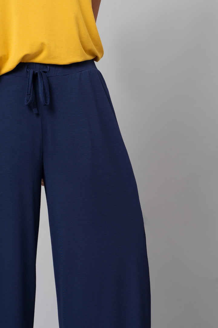 Indigo flared lounge set featuring comfortable, stylish design and elastic waistband.